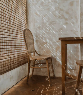 The,Wooden,Table,And,Chairs,Near,The,Window,In,Cafe